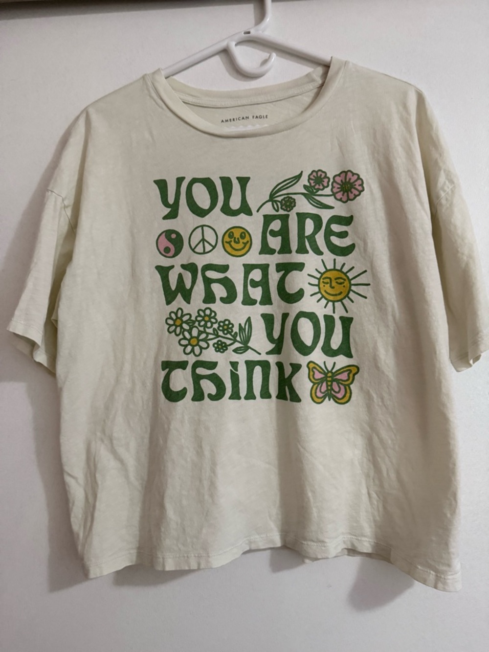 American Eagle Cream Tee with Green Graphic